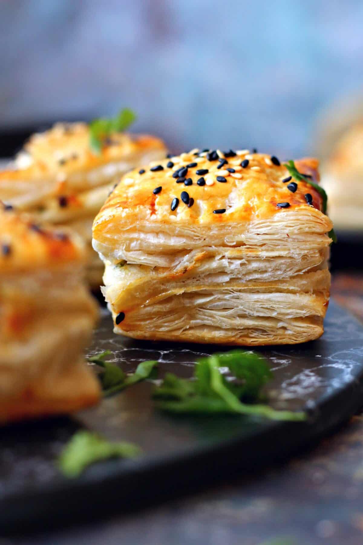 Flaky layers of a chicken puff pastry.