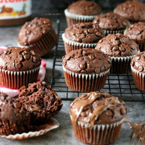 Nutella stuffed double chocolate muffins on a cooling rack