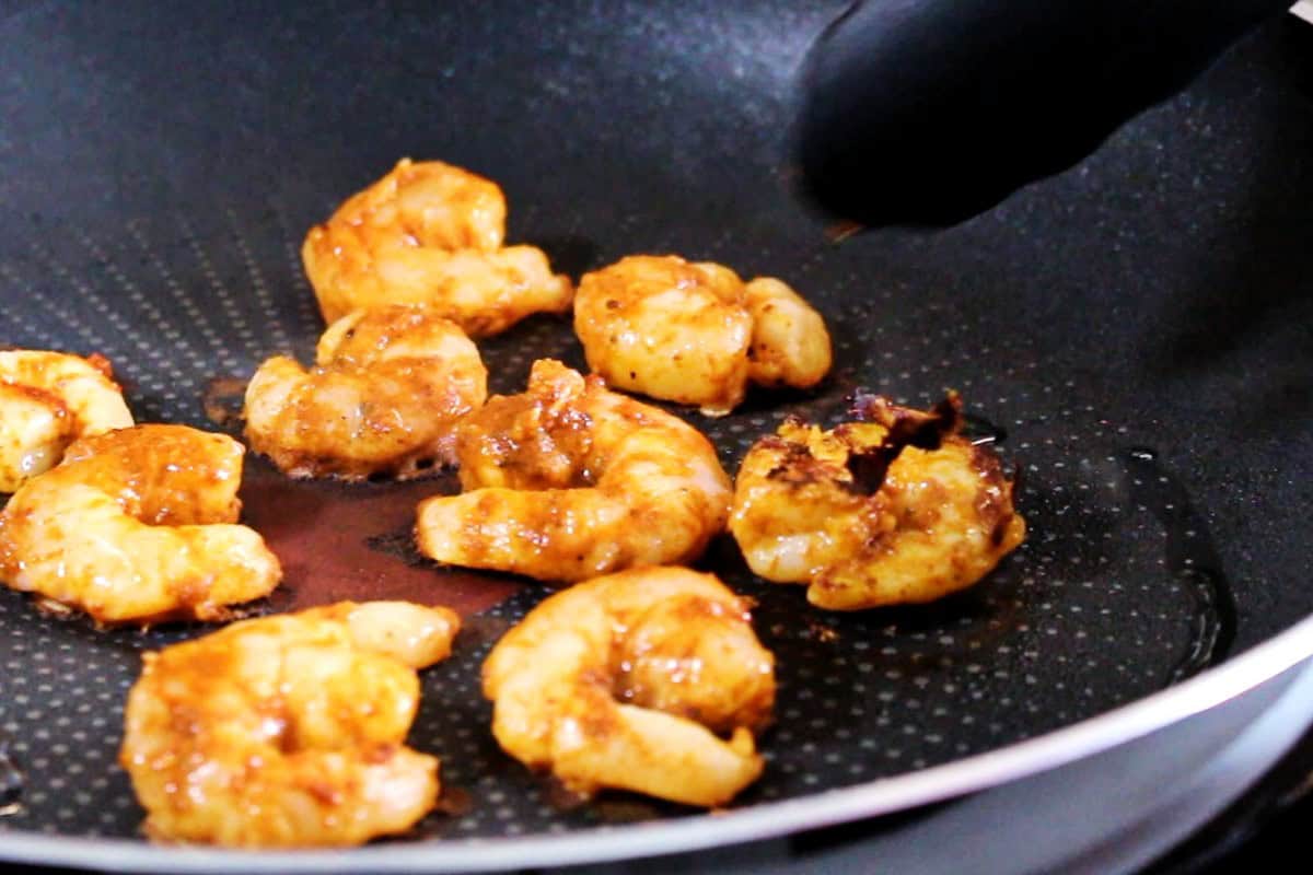 Cooking shrimp in a pan.