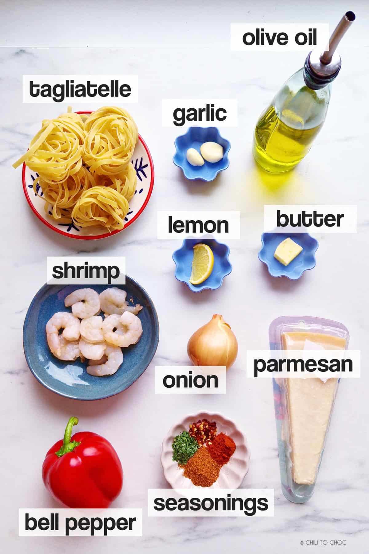 Ingredients required for making cajun shrimp pasta.