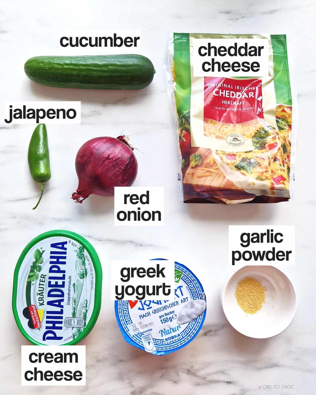 Ingredients required for making jalapeno popper cucumber salad.