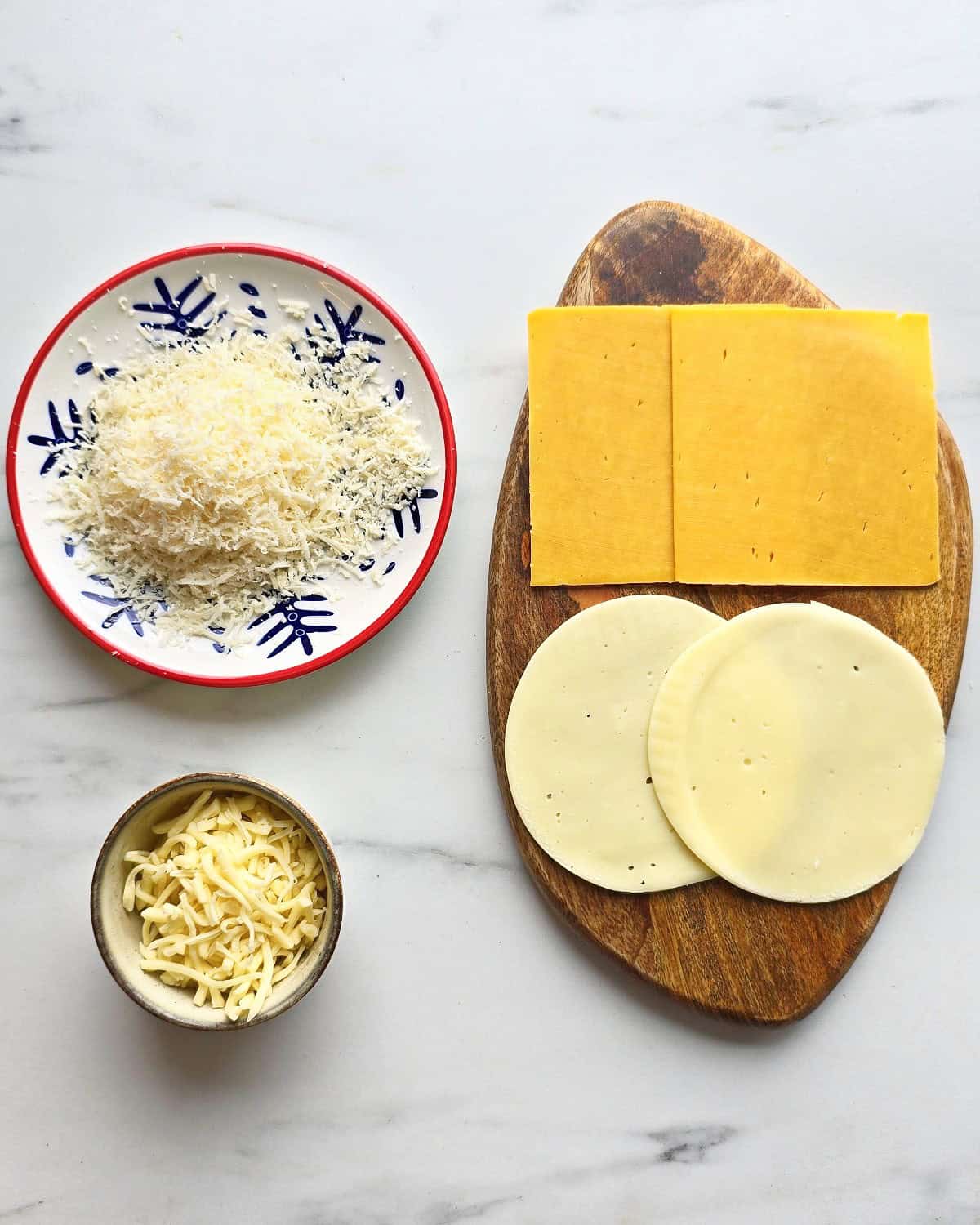 Four kinds of cheeses for making sourdough grilled cheese.