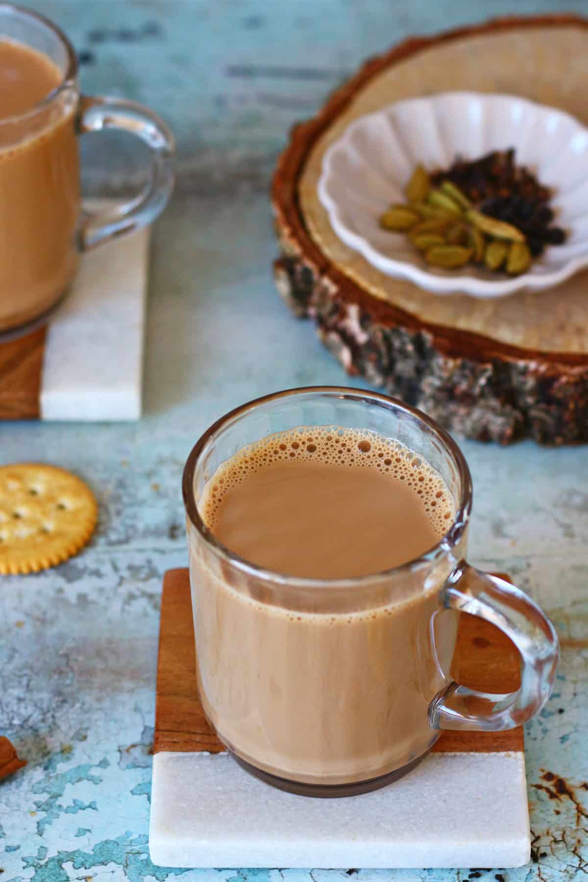 Frothy masala chai in a mug.