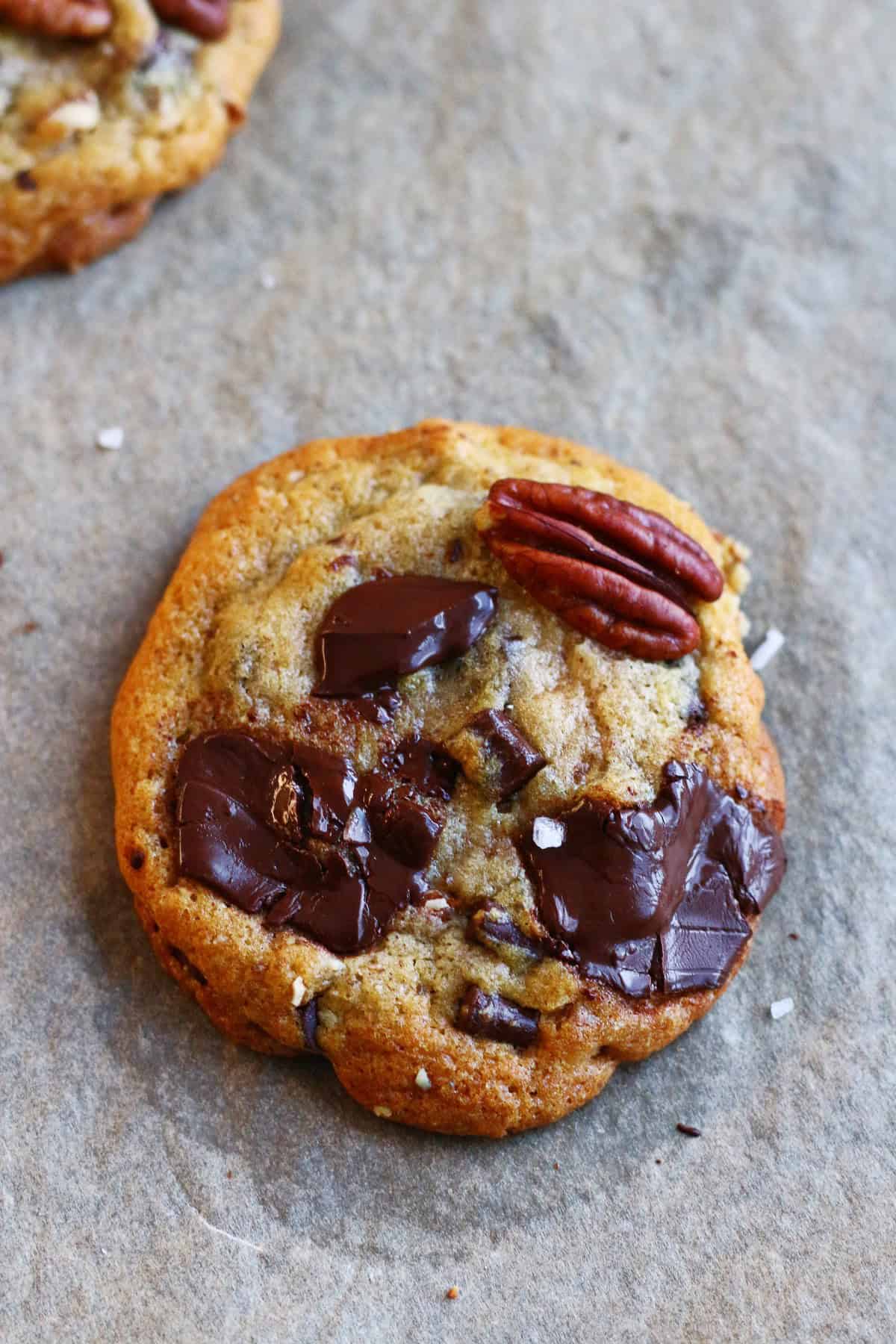 One cookie with melty chopped chocolate, pecan and sea salt.