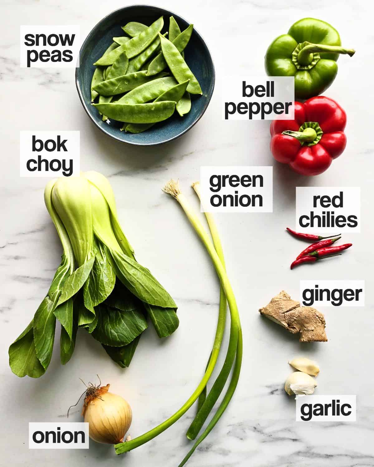 Labeled ingredients for veggies to stir fry.