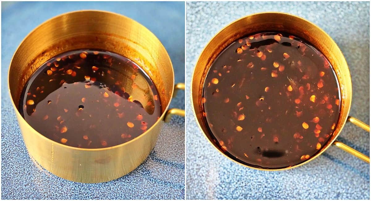 Red firecracker sauce in a gold measuring cup.