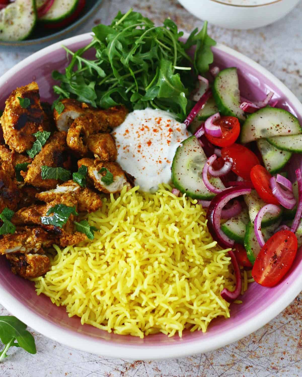 An assembled chicken shawarma bowl.