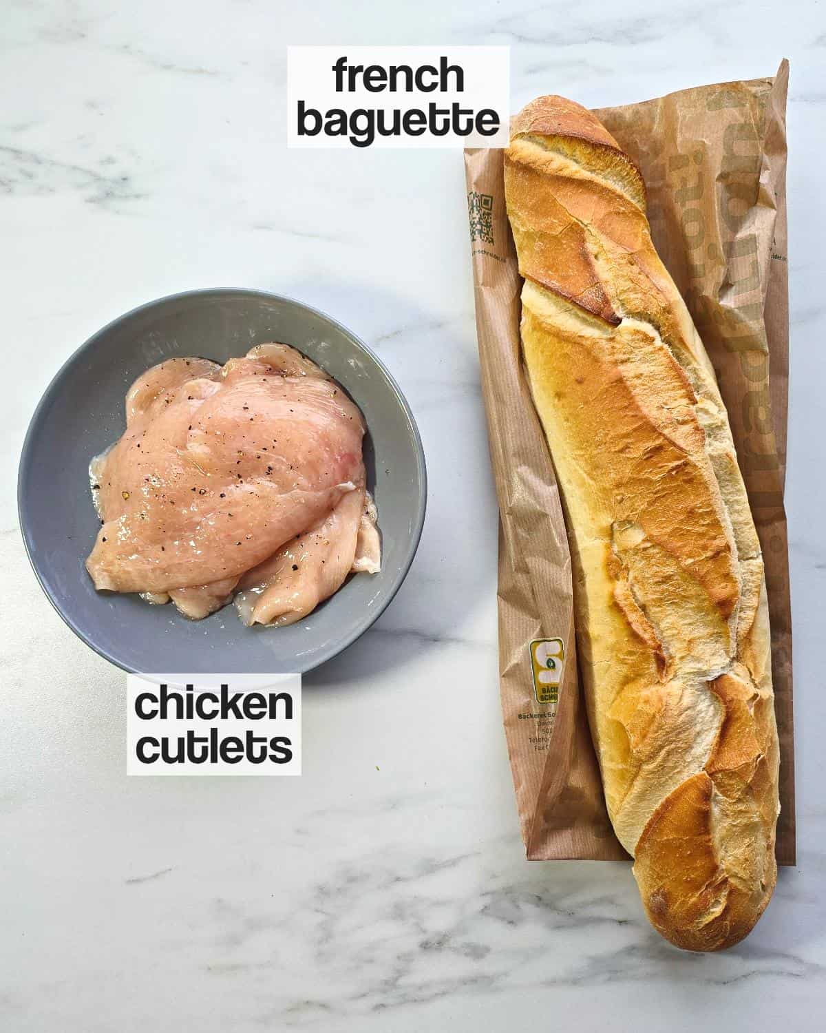 Labeled ingredients of chicken cutlets and french baguette.